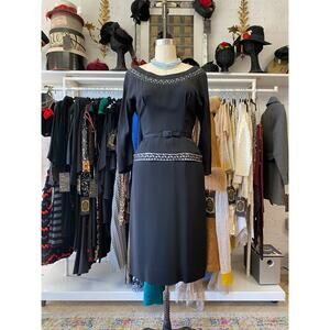 Vintage 1950s black satin peplum style dress by nat tuman, maisel, 50s fashion